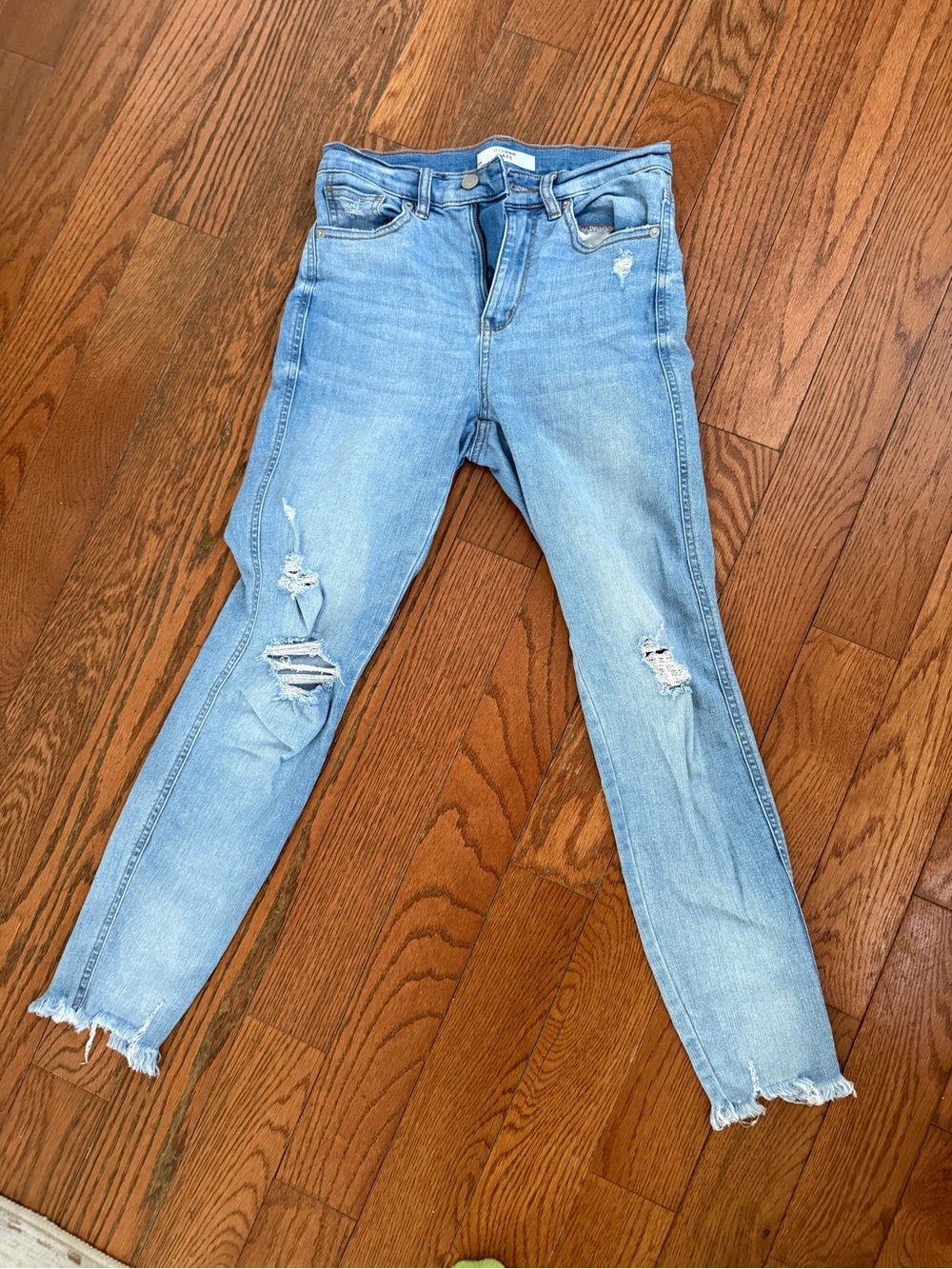 Light Wash Skinny Jeans with Distressed Knees
